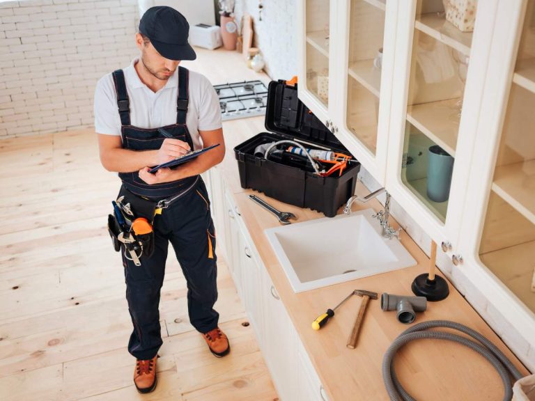 Professional handyman from Hailey's Pro Services working on a home project