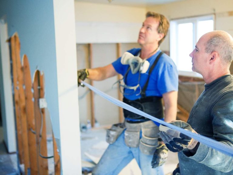 Handyman working on a home renovation project, assisting with various tasks.